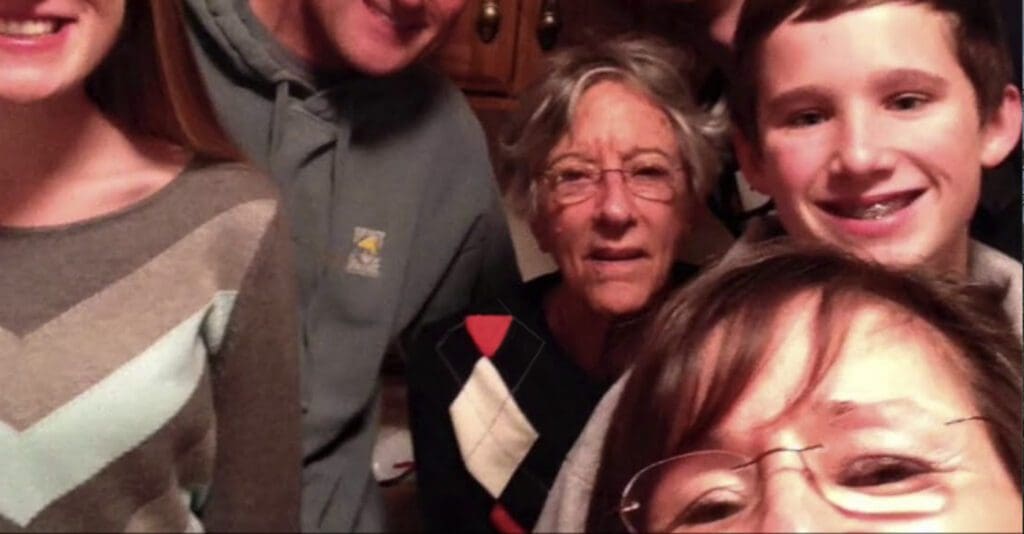 Family enjoying time with Charter Senior Living Resident